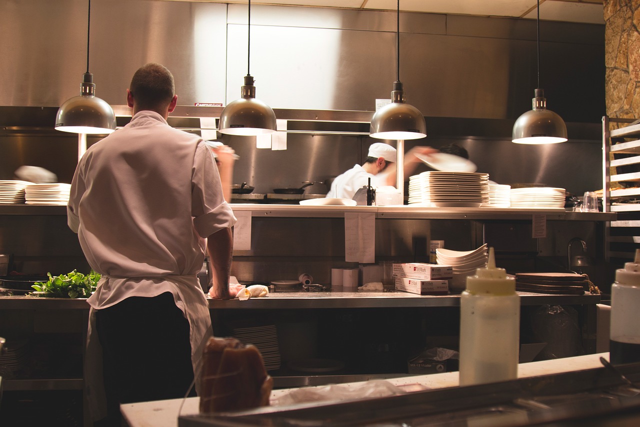 restaurant staff in a commercial kitchen